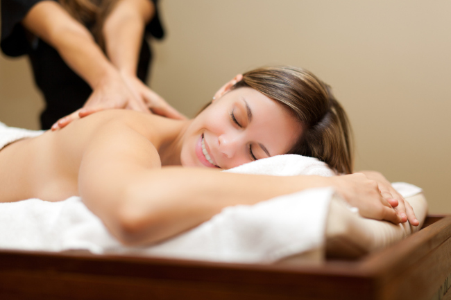A woman having a massage and a spa
