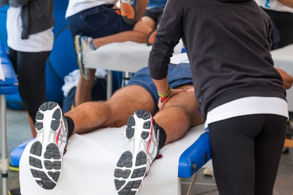 An athlete having a massage before the game starts