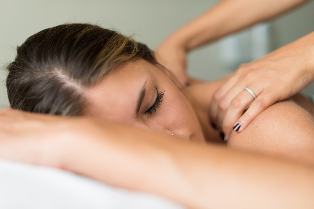 A woman having therapeutic massage therapy